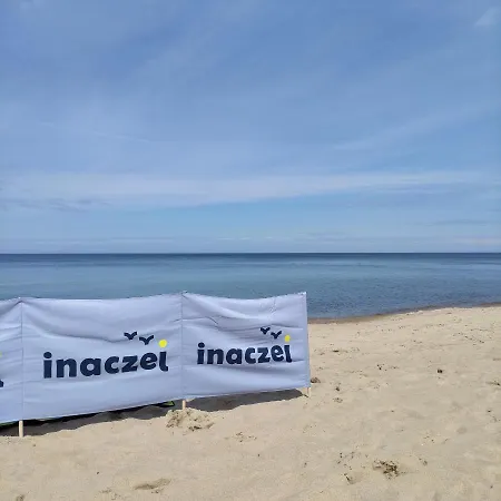 Inaczej *