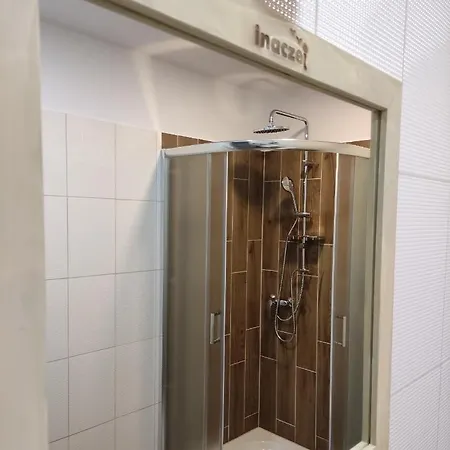 Inaczej